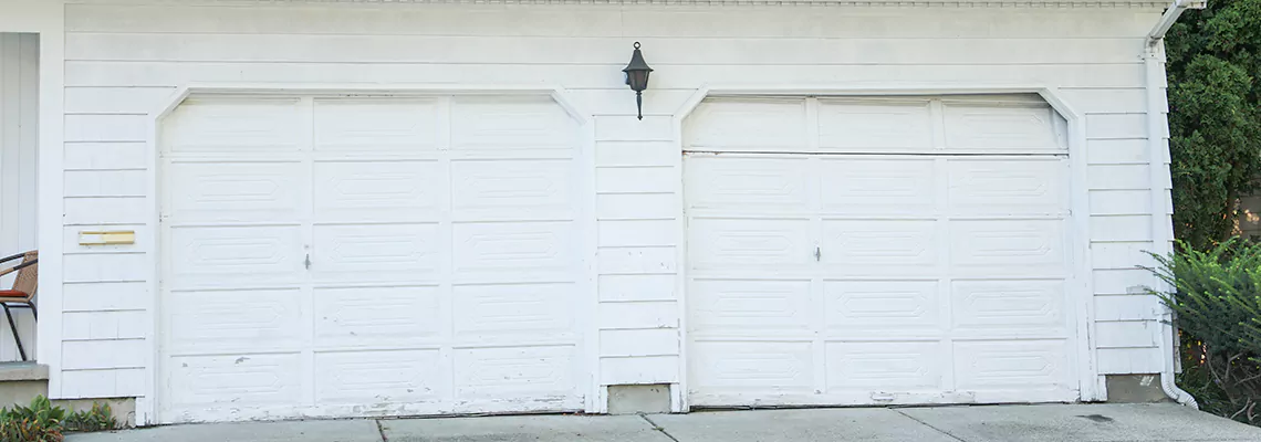 Roller Garage Door Dropped Down Replacement in Merritt Island, FL