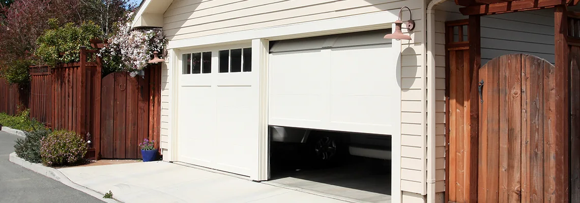 Fix Metal Garage Door Jerking in Merritt Island, Florida